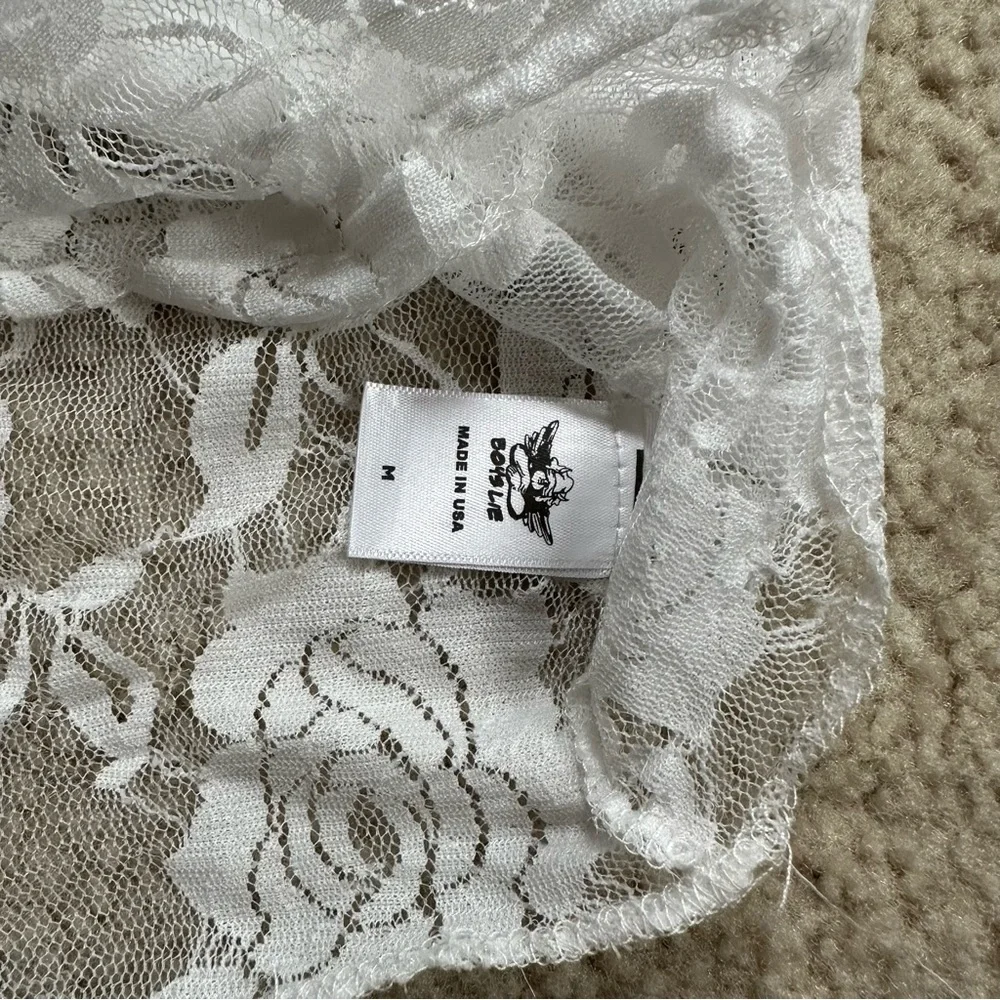 Relisted in my closet!
Boys Lie UO Urban Outfitters white cropped lace bustier - Picture 3 of 7